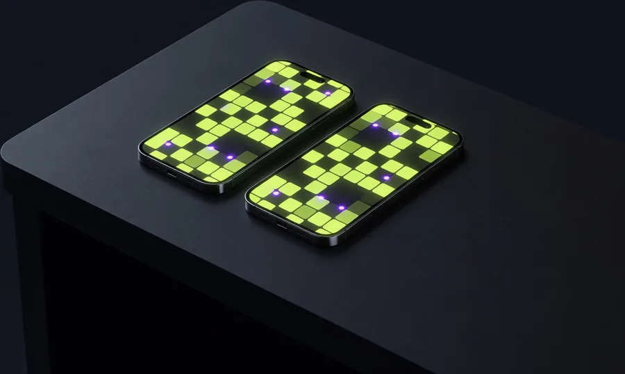Illustratie: iPhone en Android naast elkaar op een bureau